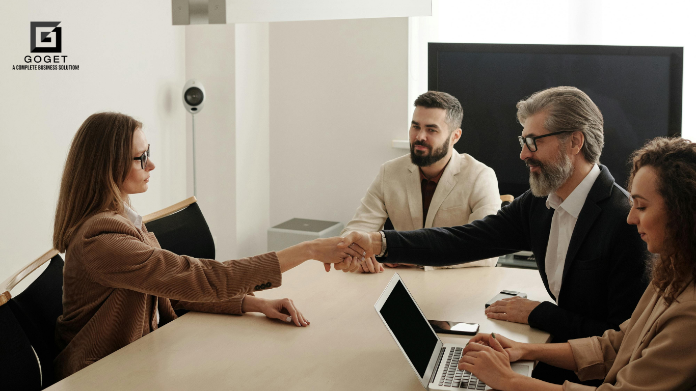 Apply for business loan in Saskatchewan with Go Get Inc. – business owner reviewing financial documents